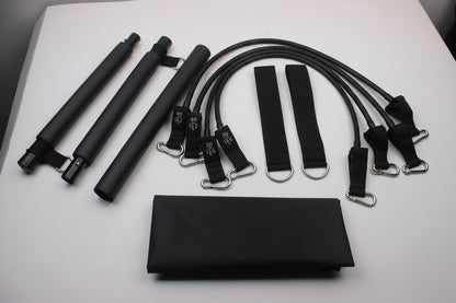 Multifunctional Pilates bar with resistance bands and foot straps