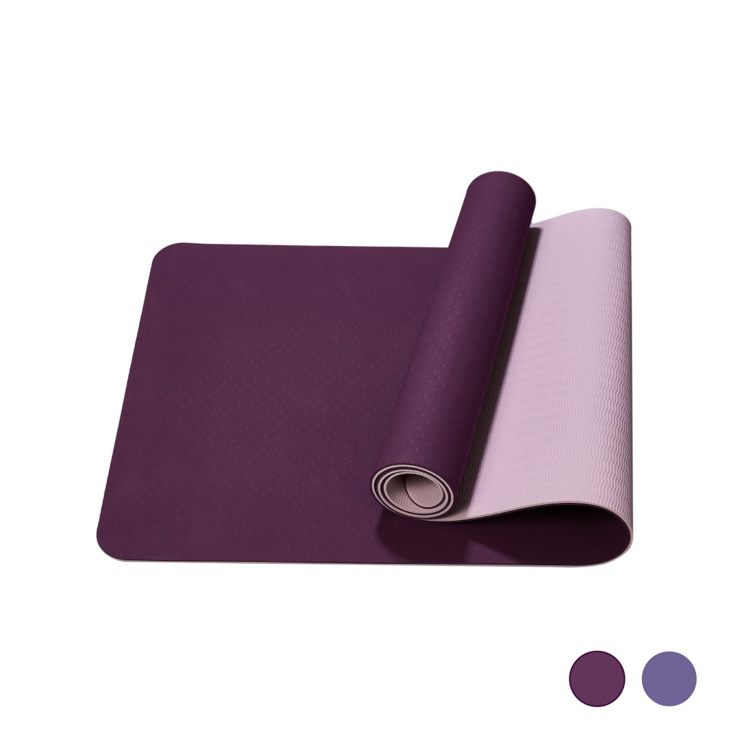 Purple TPE yoga mat rolled up for portable storage