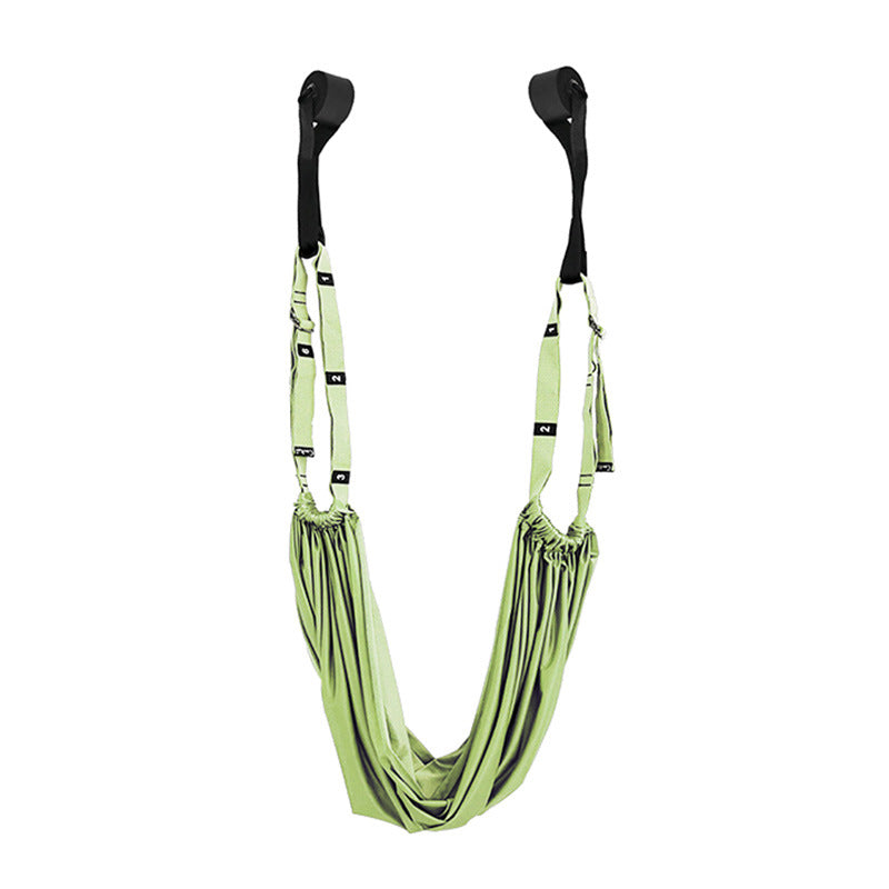 Green antigravity yoga hammock with black straps on a white background